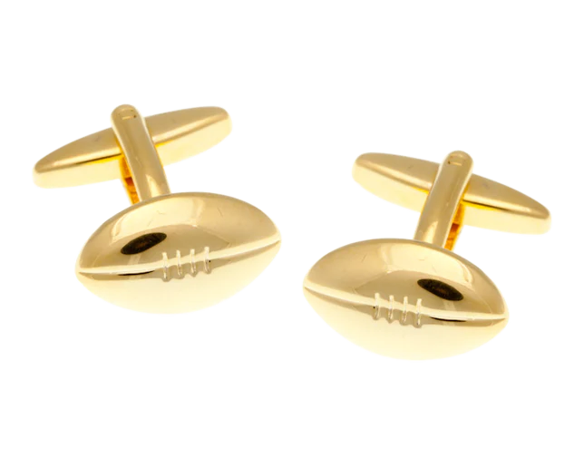 gold rugby ball cufflinks on white background