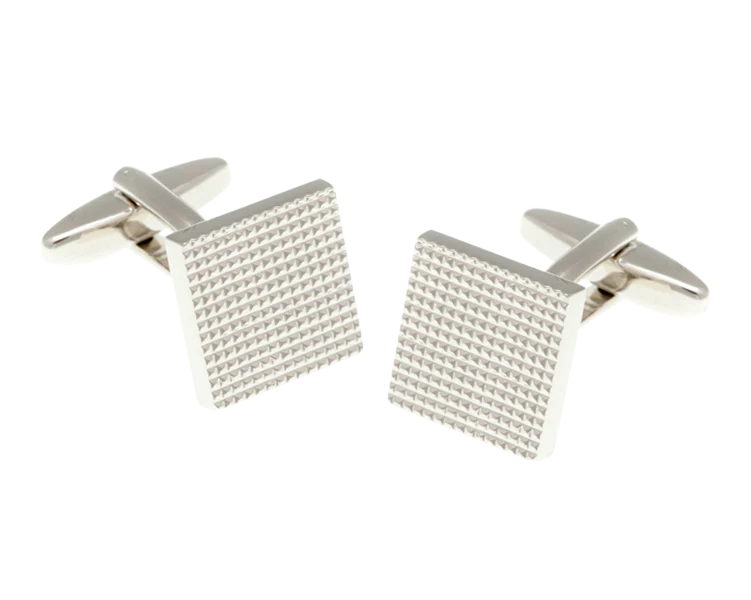 Silver square cufflinks with textured design on a white background