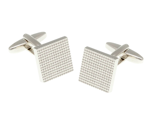 Silver square cufflinks with textured design on a white background