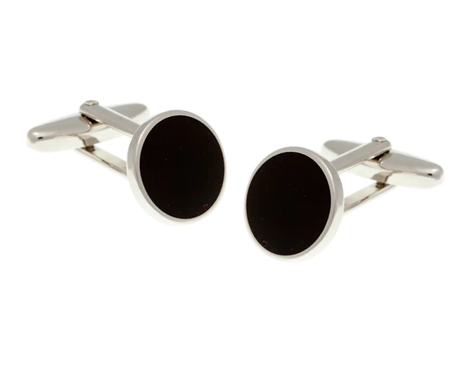 Round cufflinks with black centers and silver borders on a white background