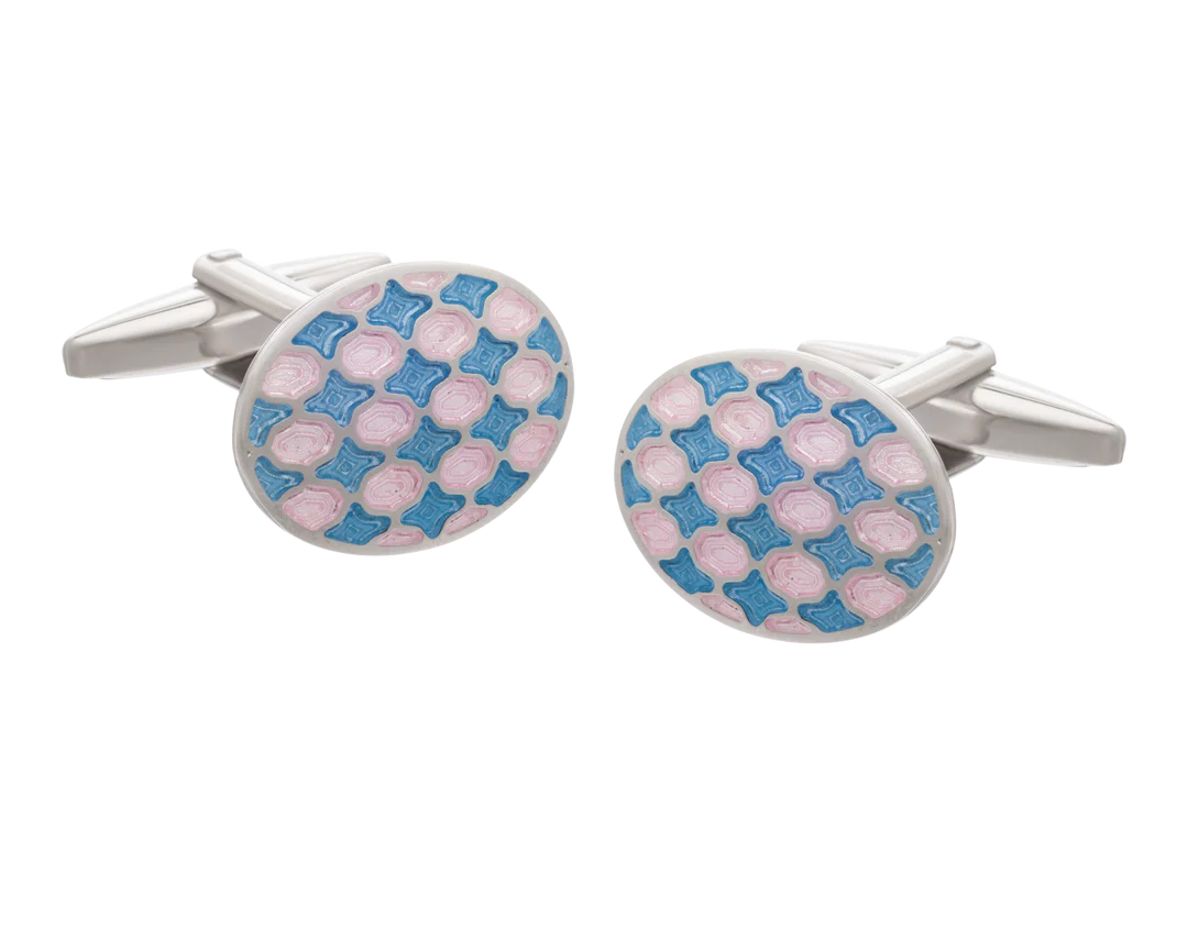 Pair of cufflinks with pink and blue checkered pattern on a white background