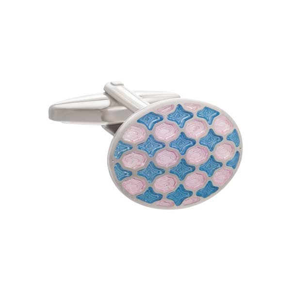 Cufflink with pink and blue pattern on a white background
