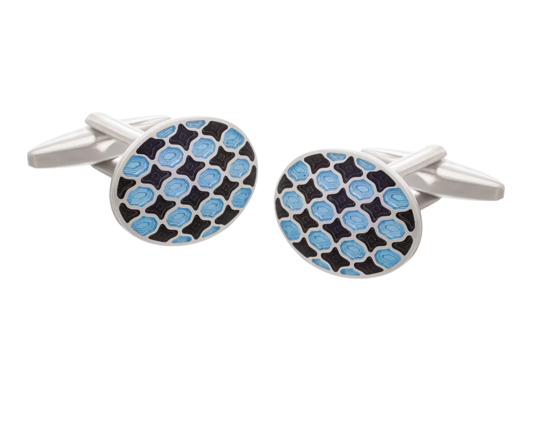 Cufflinks with blue and black pattern on a white background