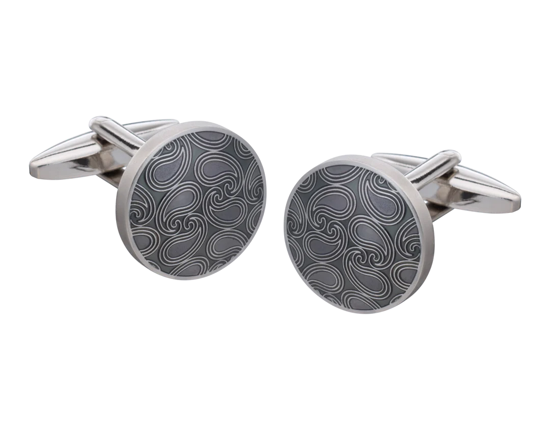 Silver cufflinks with a black pattern on a white background