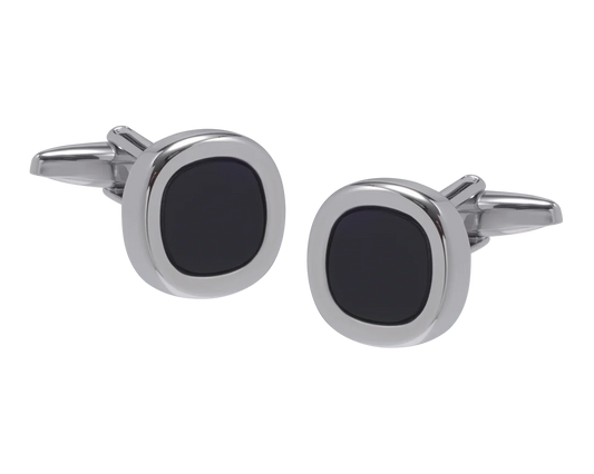 Cufflinks with black stones and silver metal on a white background