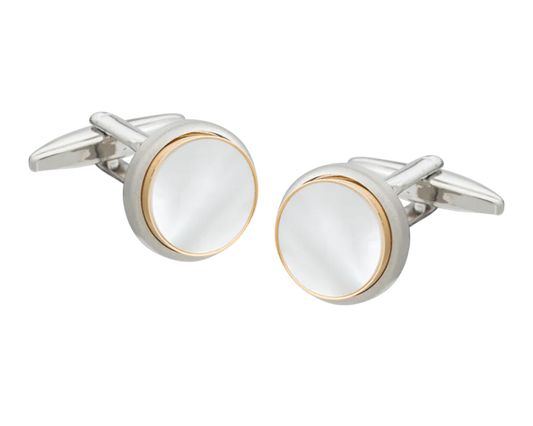 Silver and gold cufflink on a white background