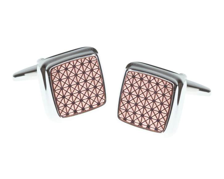 Cufflinks with geometric pattern on a white background