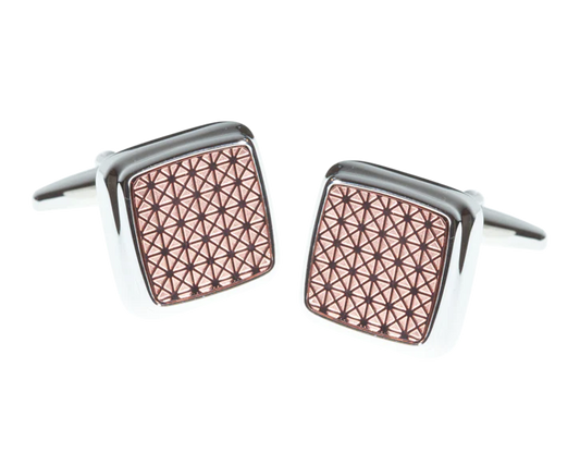 Cufflinks with geometric pattern on a white background