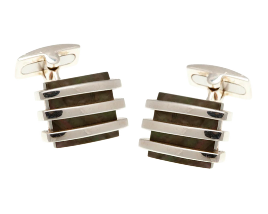 Pair of silver and black striped cufflinks on a white background