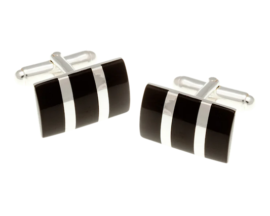 Black and silver cufflinks on a white background