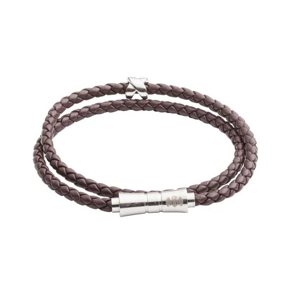 Brown braided leather bracelet with silver clasp on a white background