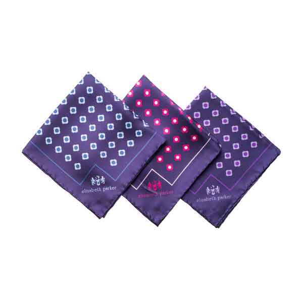 Three purple patterned handkerchiefs on a white background