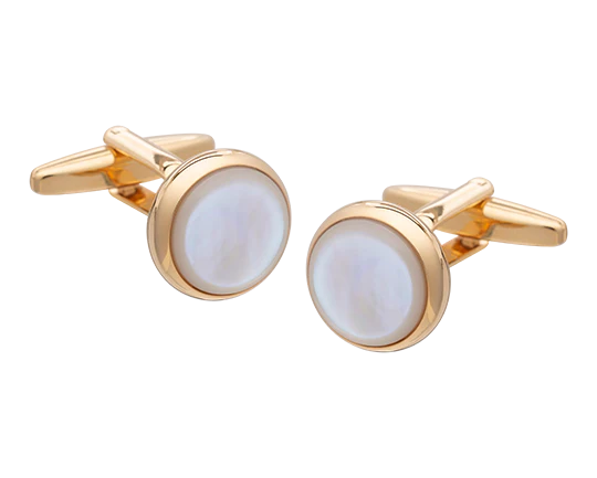Gold cufflinks with round white stones on a white background