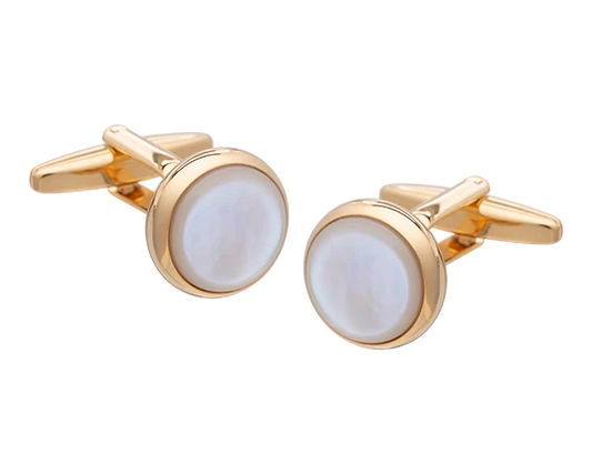 Gold cufflinks with round white stones on a white background