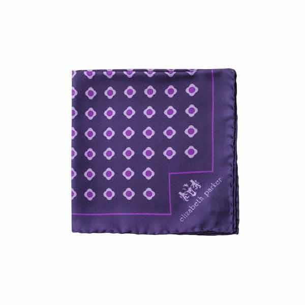 Purple pocket square with a geometric pattern and 'elizabeth parker' branding on a white background