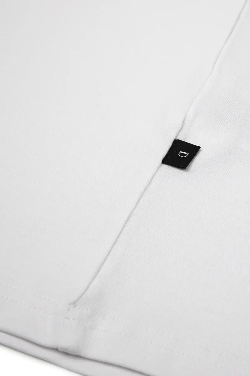 side detail white tshirt on white background