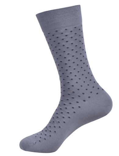 Gray sock with black dots on a white background