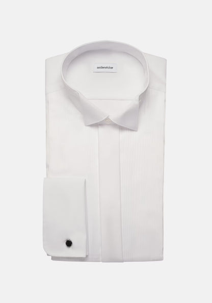 White dress shirt with black cufflink on a white background