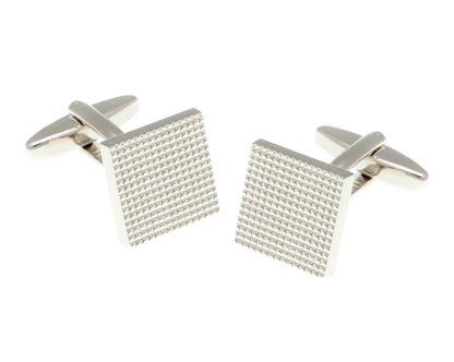 Silver square cufflinks with textured design on a white background