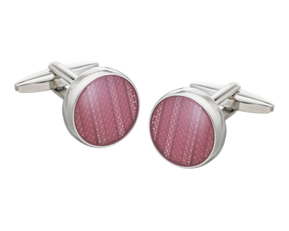 round pink cufflinks on white background