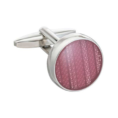 round pink cufflinks on white background