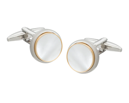 Silver and gold cufflink on a white background