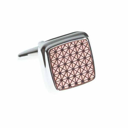 Cufflink with geometric pattern on a white background