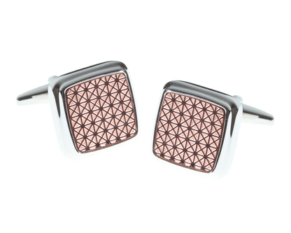 Cufflinks with geometric pattern on a white background