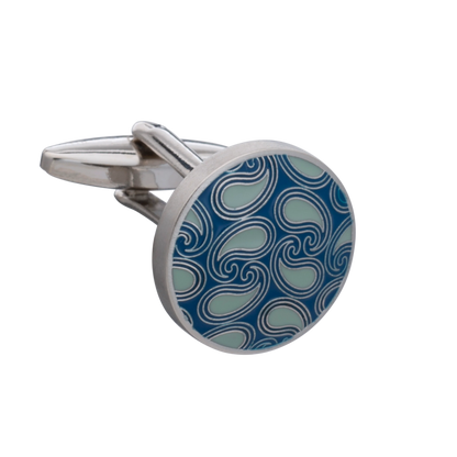 Cufflink with blue and silver paisley pattern on a white background