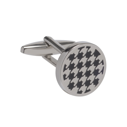 round black houndstooth cufflink on white background