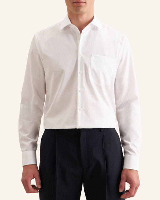 White dress shirt and black pants on a white background