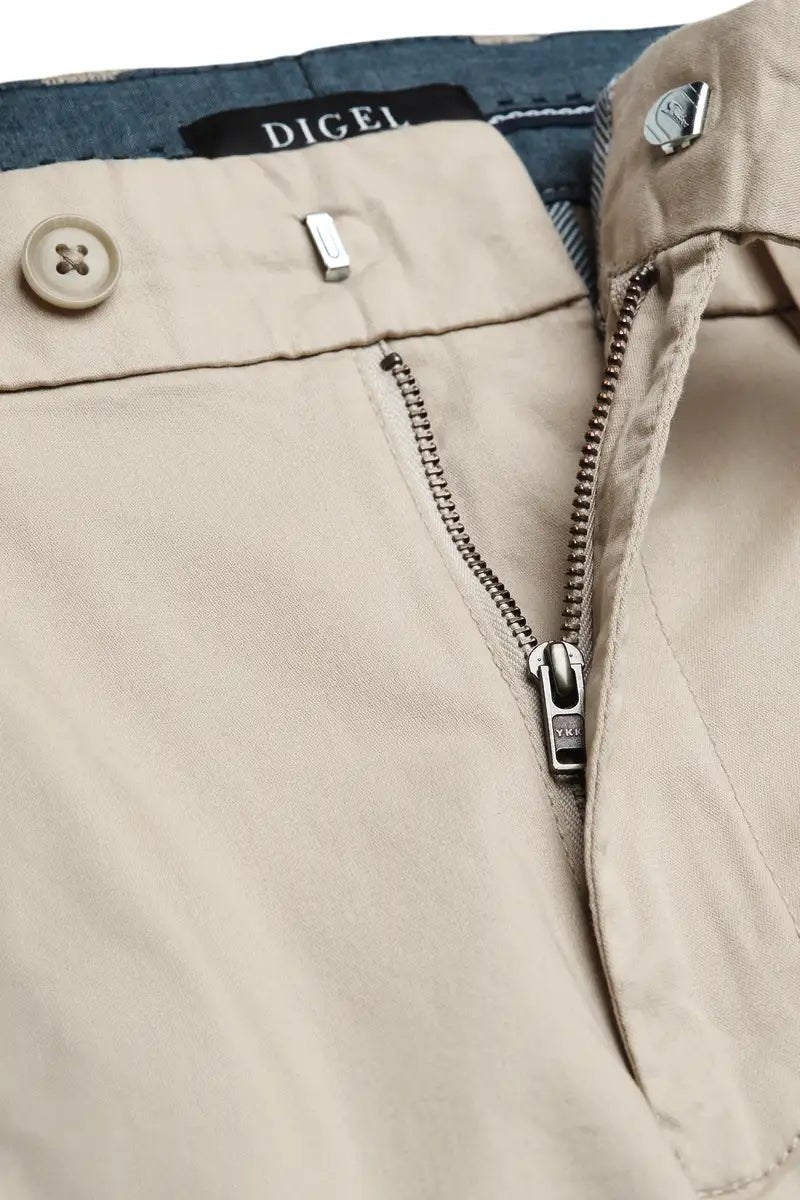 beige chinos close up zippef on white background