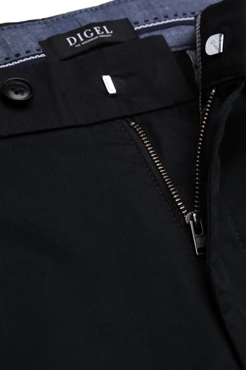 black chinos close up zipper on white background