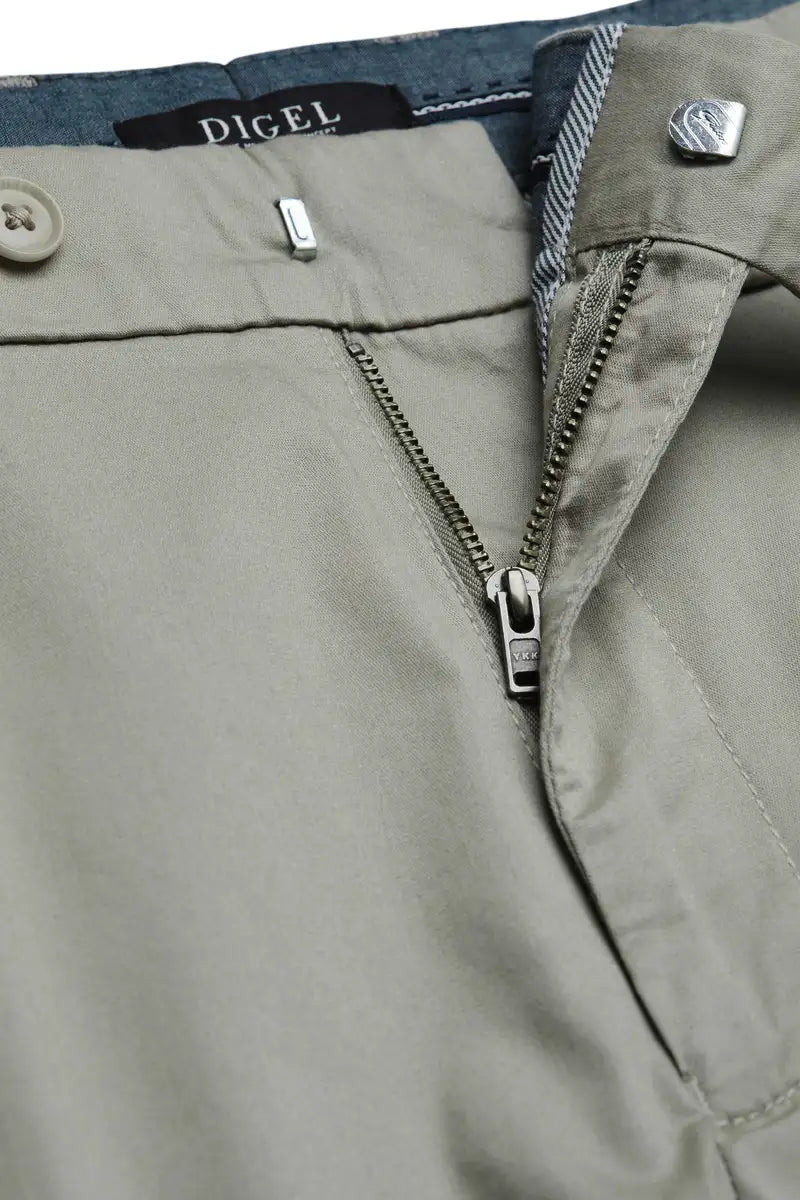 olive chinos close up zipper on white background