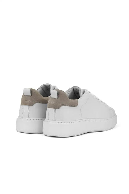 rear view white dress trainer shoe on white background