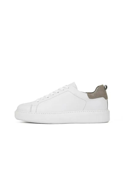 side view white dress trainer shoe on white background