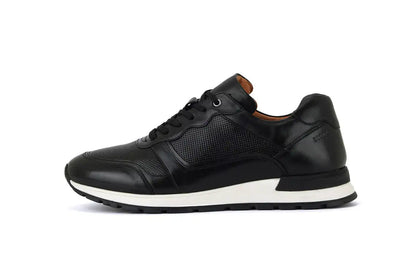side view black leather trainer shoes on white background