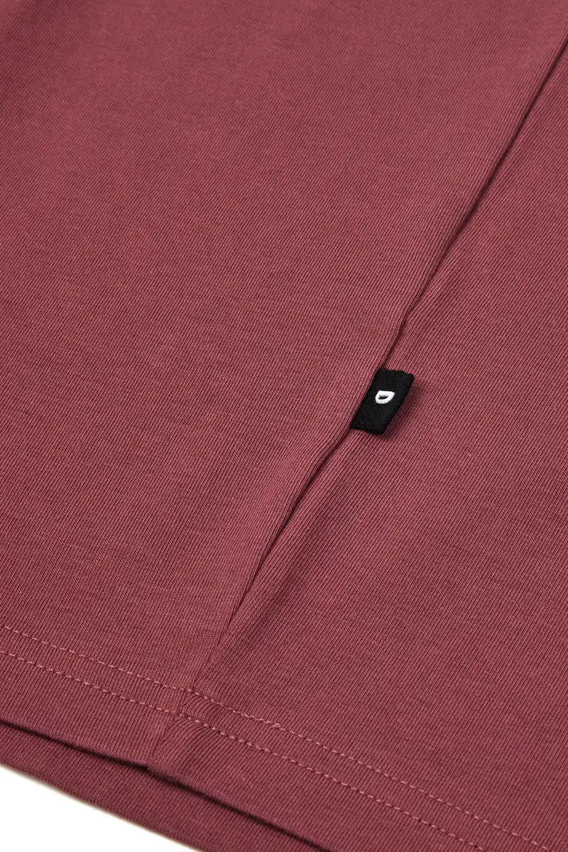 side detail red tshirt on white background