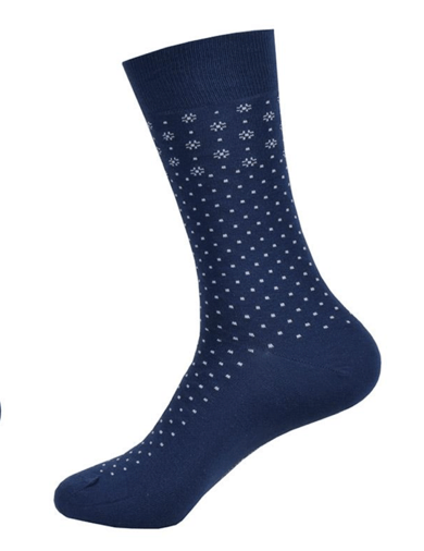 Navy blue sock with white polka dots on a white background