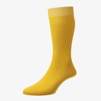 Yellow knee-high sock on a white background