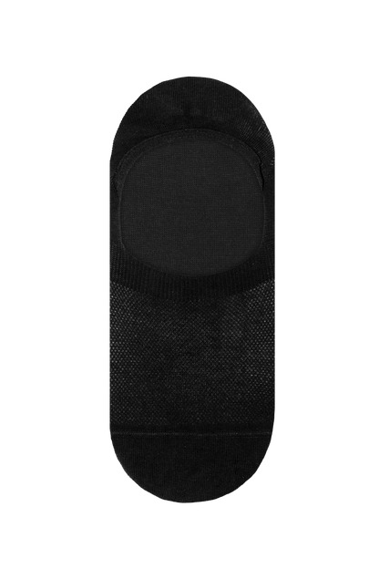 Black sock with textured sole on a transparent background