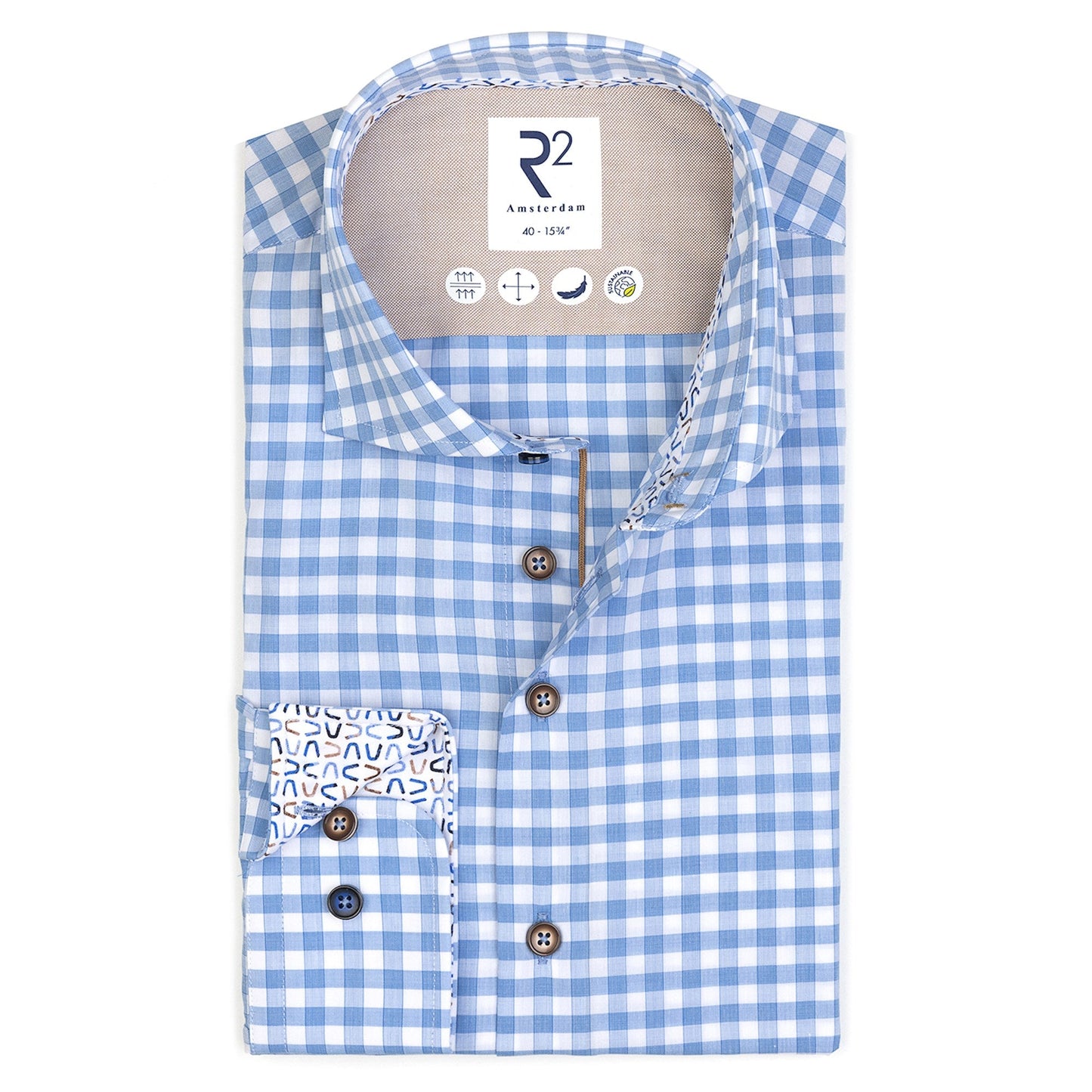 Blue and white checkered shirt with patterned pocket on a white background