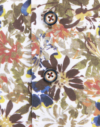 Close-up of a floral fabric with a button in the center