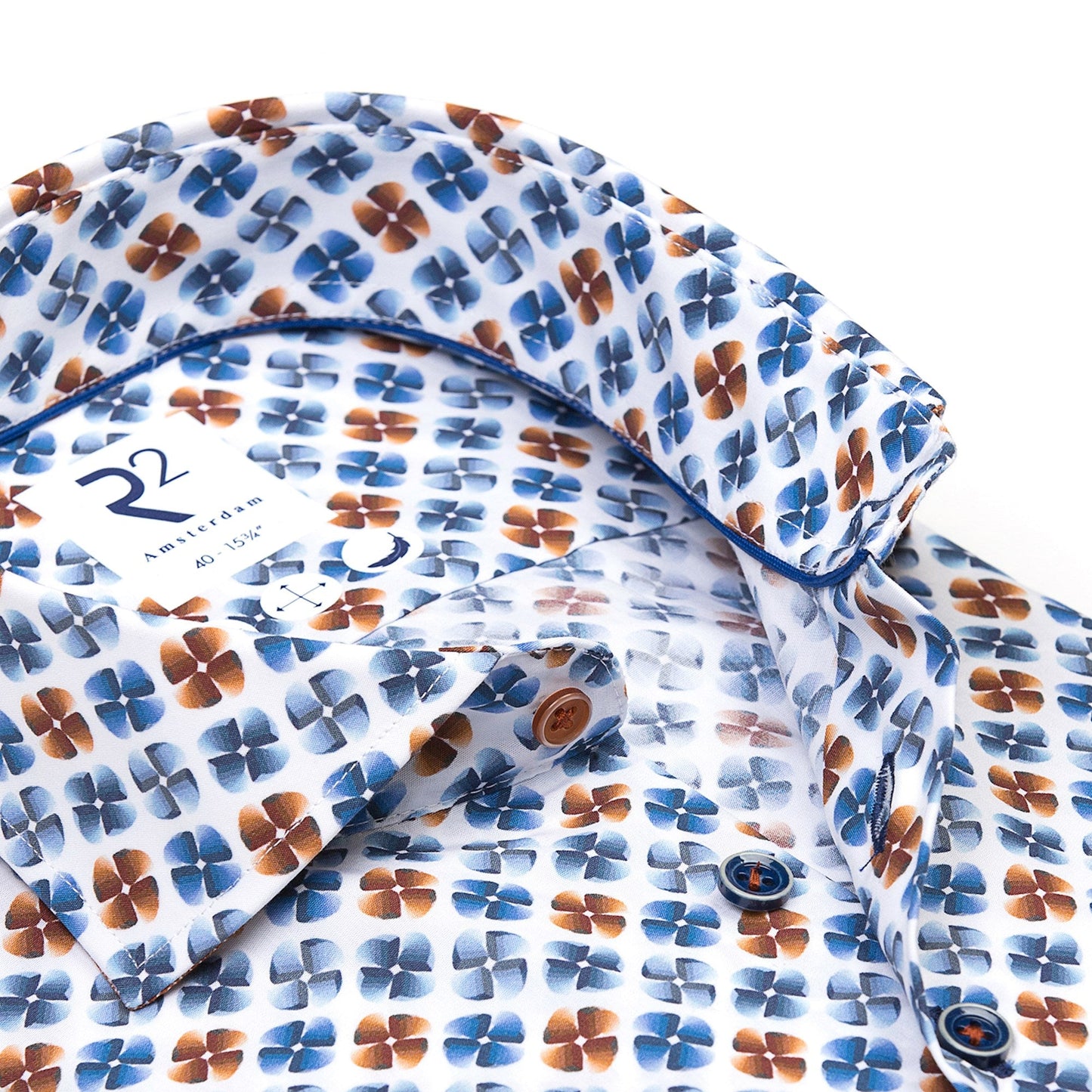 Floral-patterned shirt with a visible brand logo on a white background