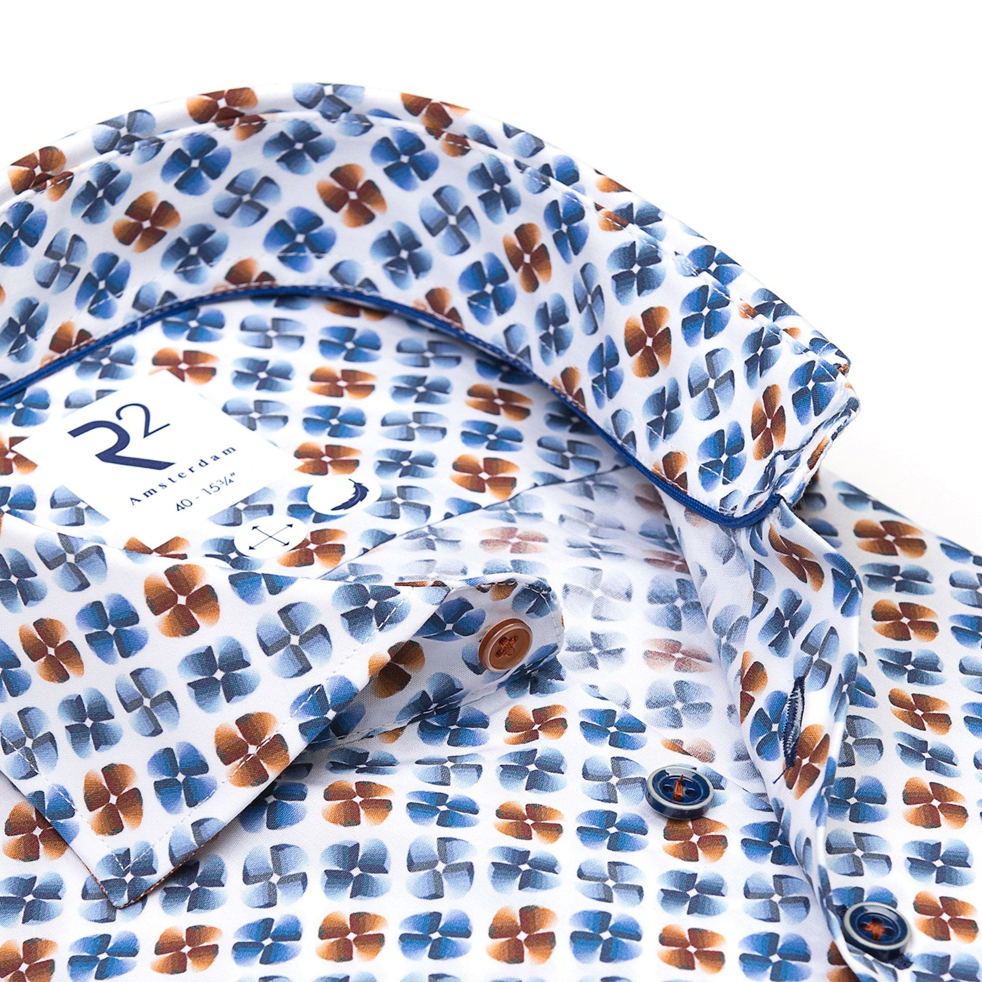 Floral-patterned shirt with a visible brand logo on a white background