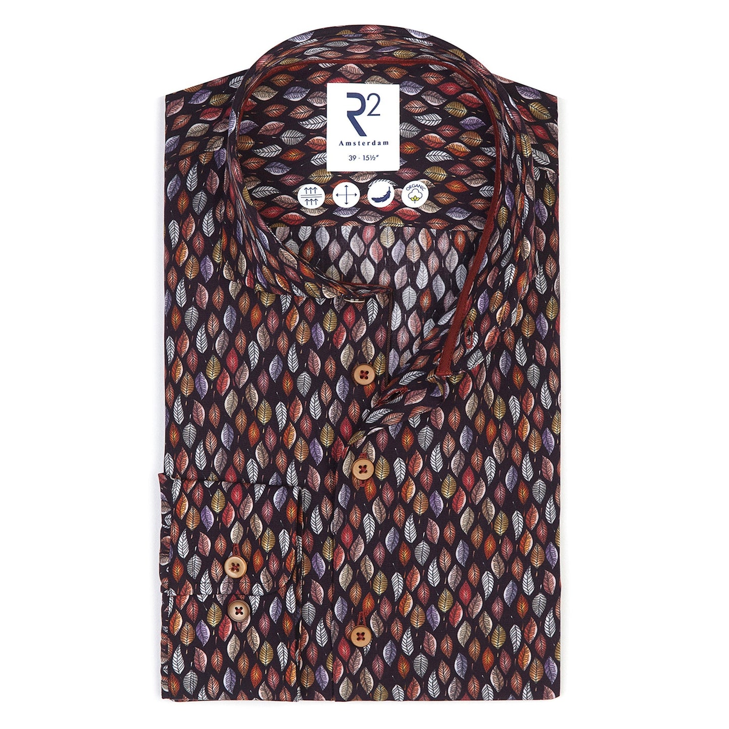 Folded patterned shirt with a brand label on a white background