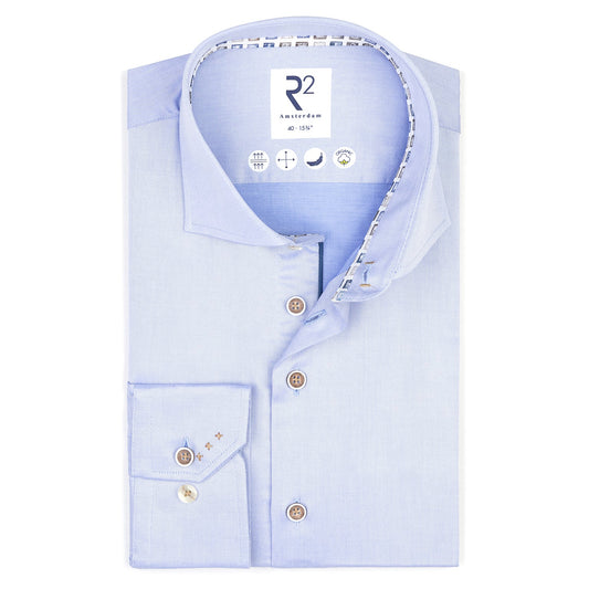 Light blue dress shirt with R2 branding on a white background