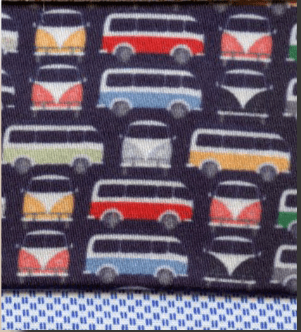 Pattern of colorful vans on a dark background