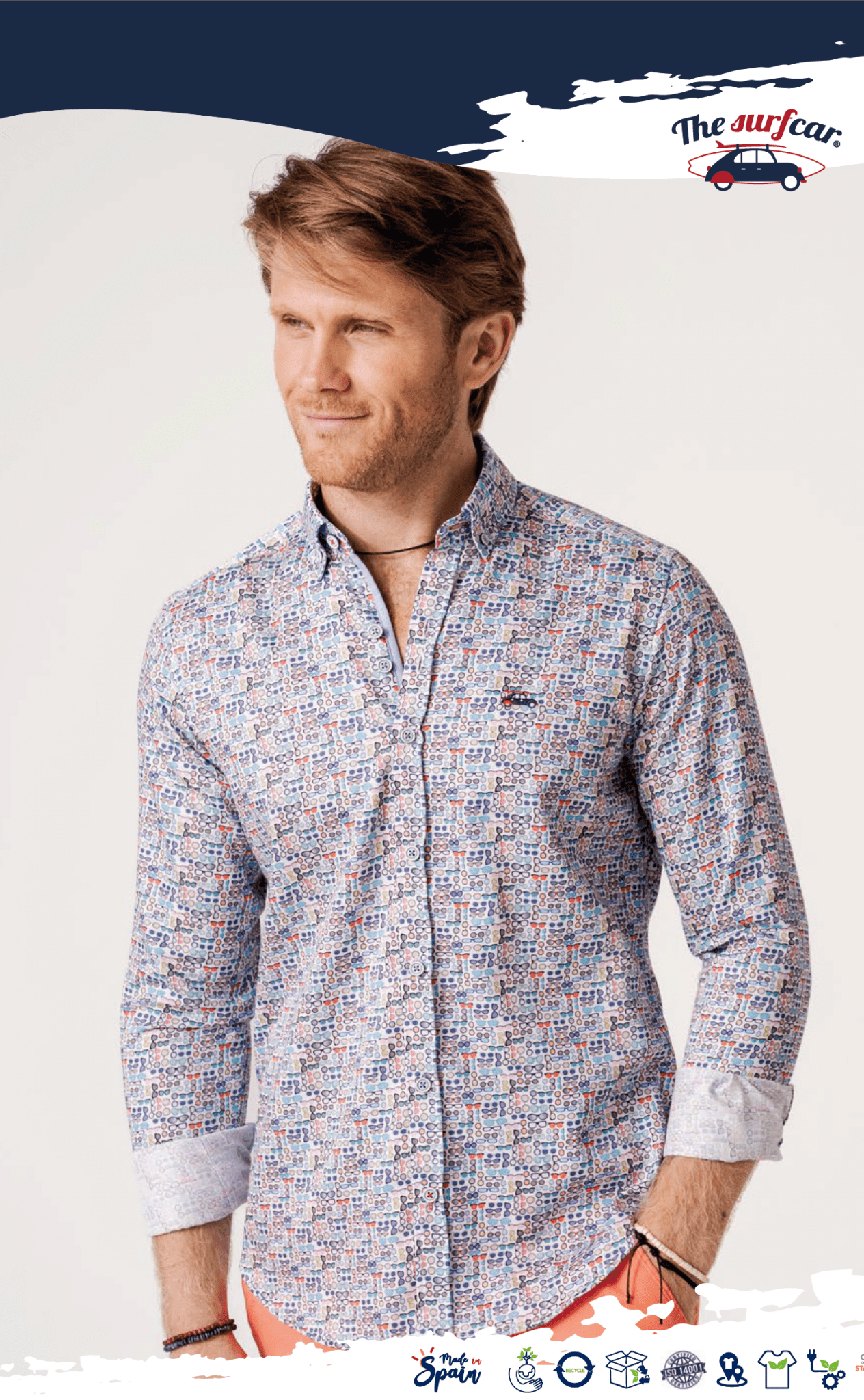Man wearing a patterned shirt with a white background