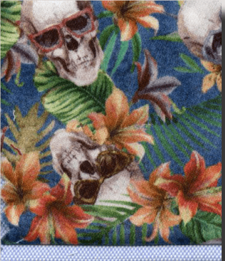 Fabric with skull and floral pattern on a blue background